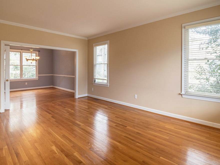 Living room with a honey oak strip floor